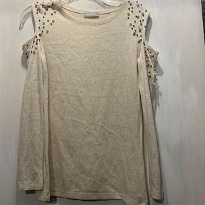 white cold shoulder beaded sweater.